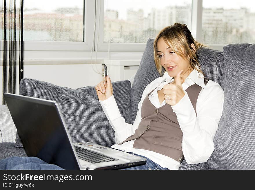 Beautiful businesswoman working at home