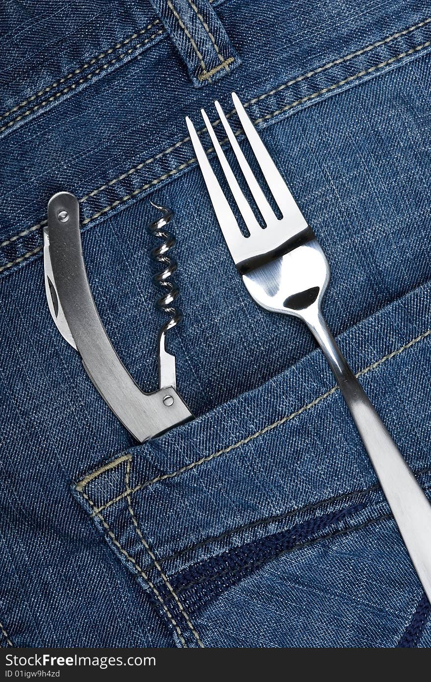 Background jeans with kitchen utensil