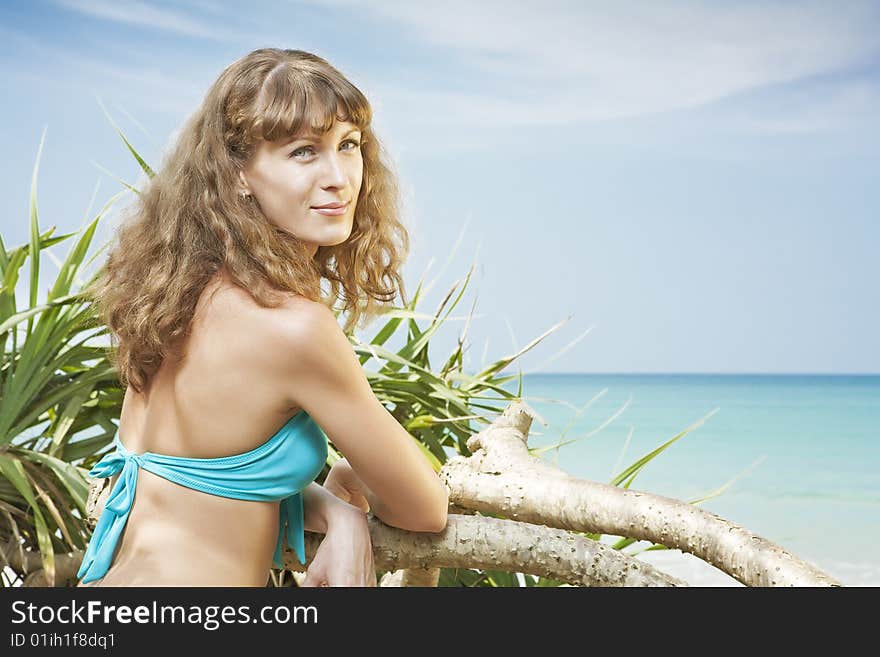 Portrait of beautiful girl having good time on tropical beach. Portrait of beautiful girl having good time on tropical beach