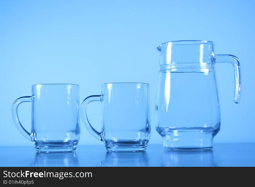 An empty glass in blue background.