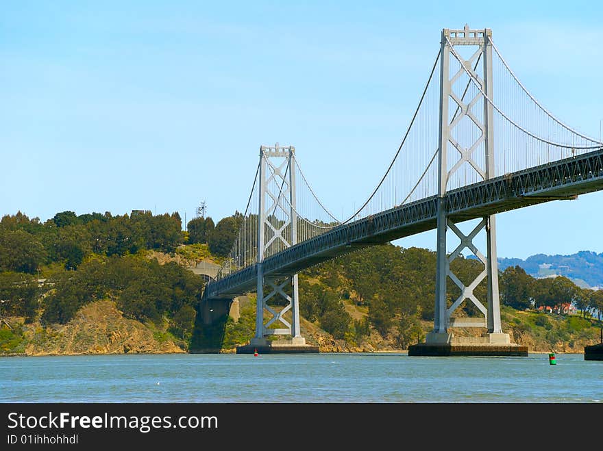 Bay bridge against blue sky background