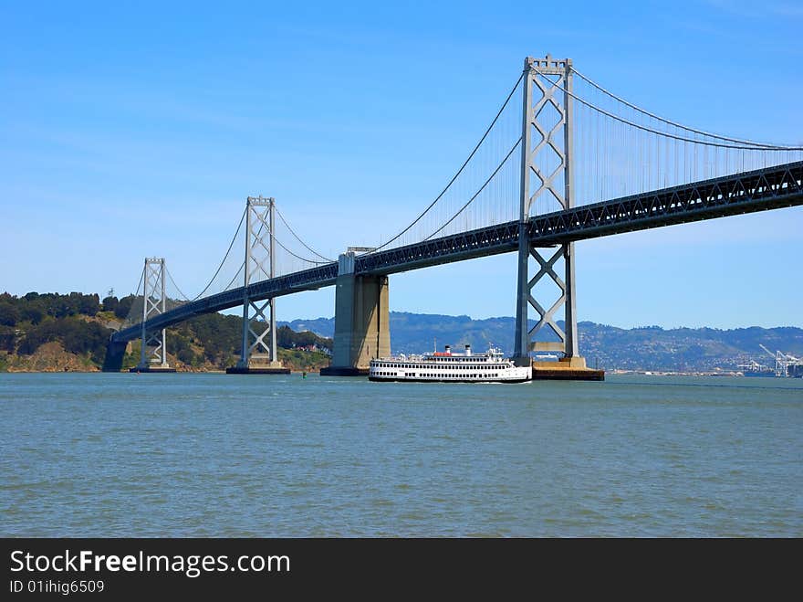 Bay bridge against blue sky background