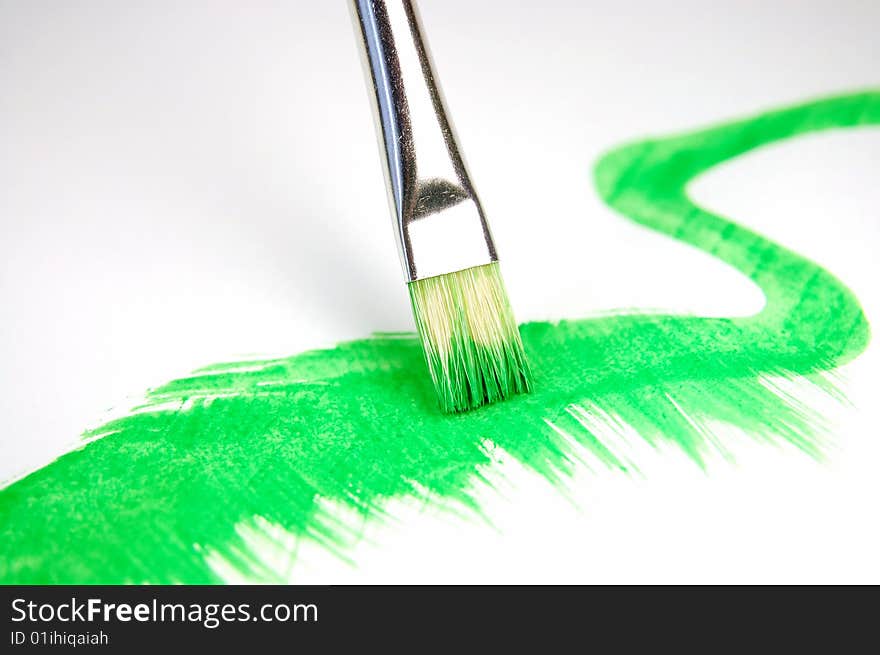 Paintbrush and painted brush stroke isolated