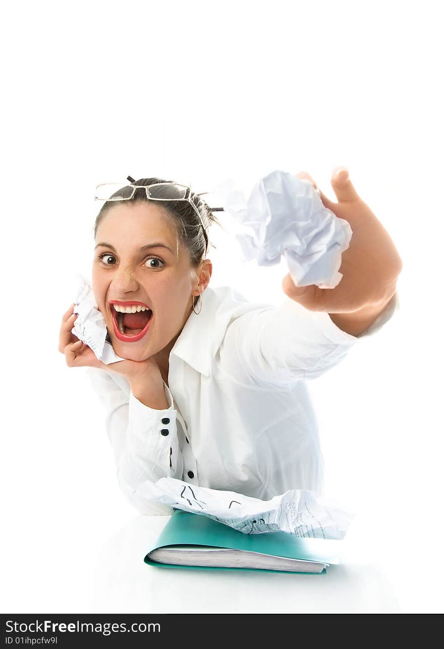 Angry young businesswoman shouting and throwing paper at us. Angry young businesswoman shouting and throwing paper at us