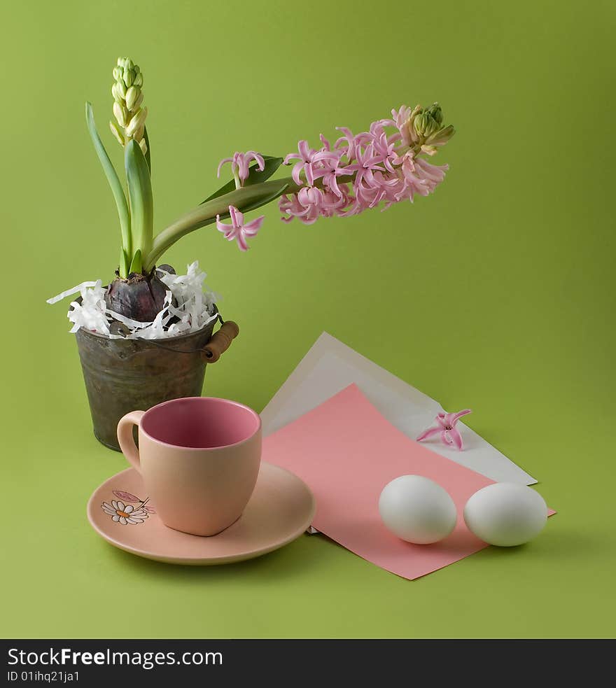 Letter with easter congratulation and teacup