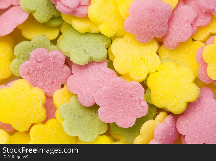 A close-up of a lot of colourful sugar decoration