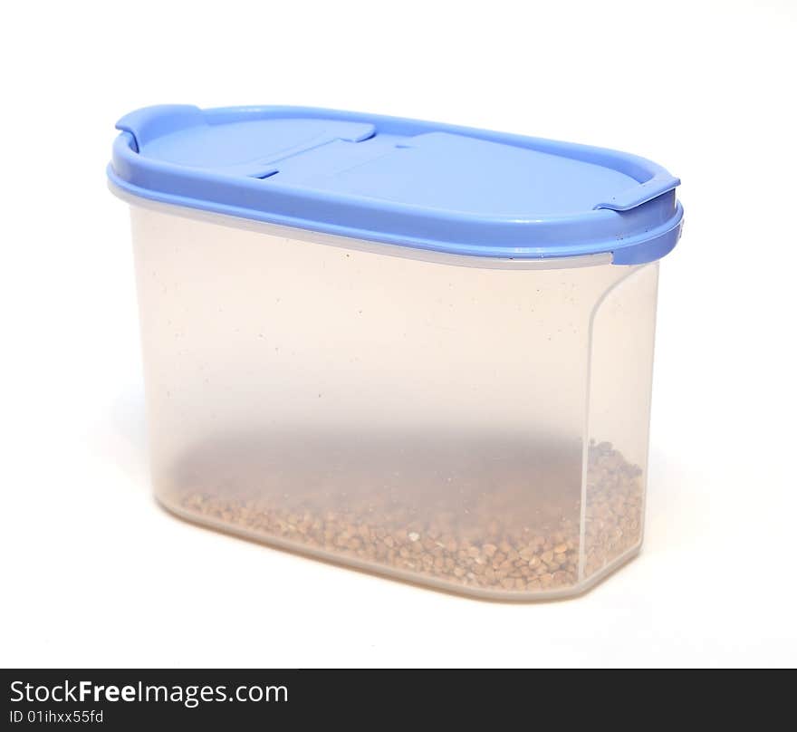 Transparent plastic food container with grain isolated on white background. Transparent plastic food container with grain isolated on white background