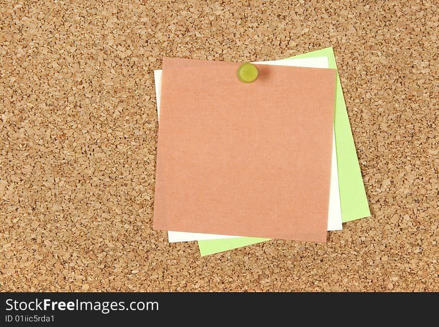 Tree colorful blank post-it notes pinned to corkboard. Tree colorful blank post-it notes pinned to corkboard.