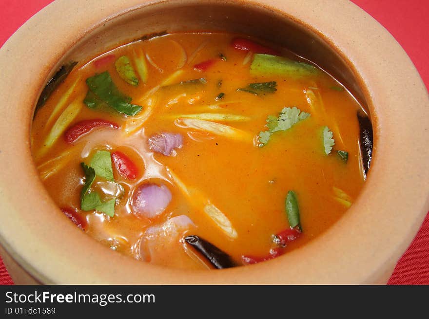 Hot soup with red background