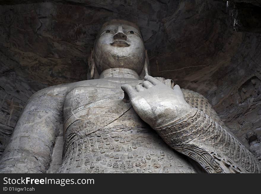 The buddha with exquisite carving and beautiful colors, in Yungang Grottoes, Datong, Shanxi province,  China. The buddha with exquisite carving and beautiful colors, in Yungang Grottoes, Datong, Shanxi province,  China.