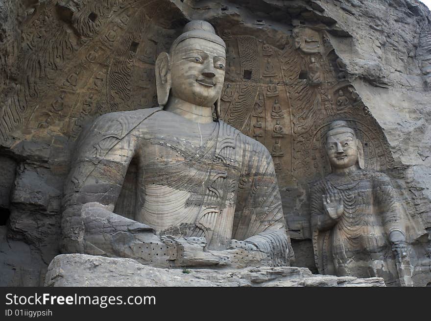 The buddha with exquisite carving and beautiful colors, in Yungang Grottoes, Datong, Shanxi province,  China. The buddha with exquisite carving and beautiful colors, in Yungang Grottoes, Datong, Shanxi province,  China.