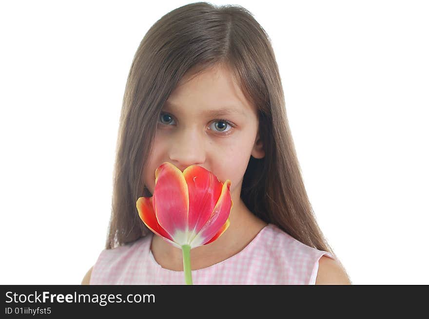 The portrait of little cute girl with flower