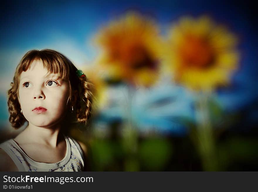 Girl And Sunflowers