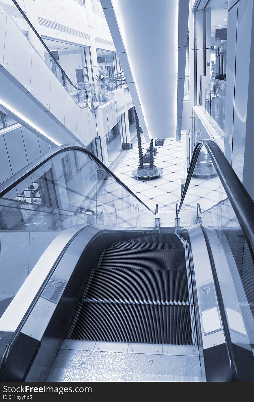 Shopper and escalator