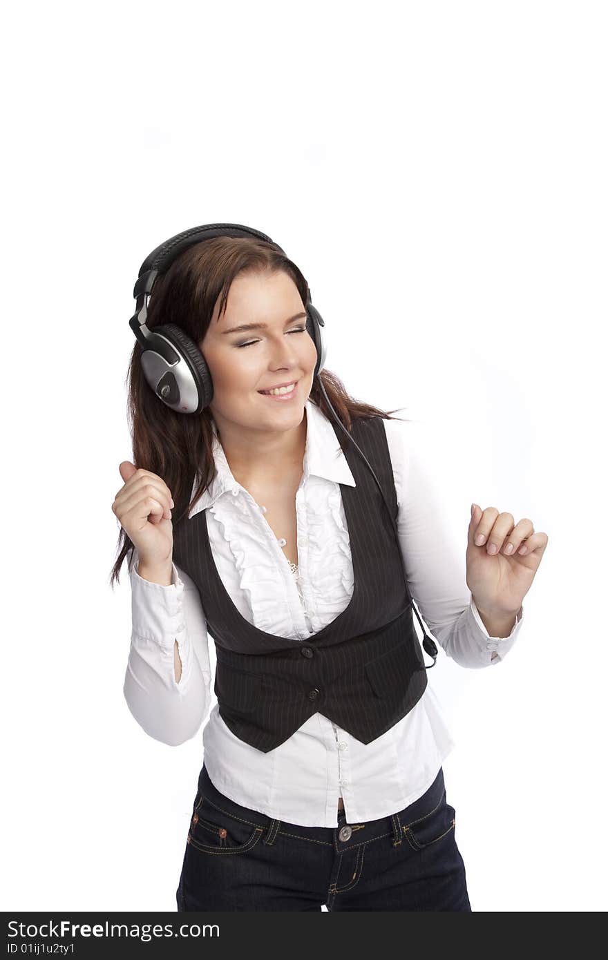 Isolated young business woman listening music over white background