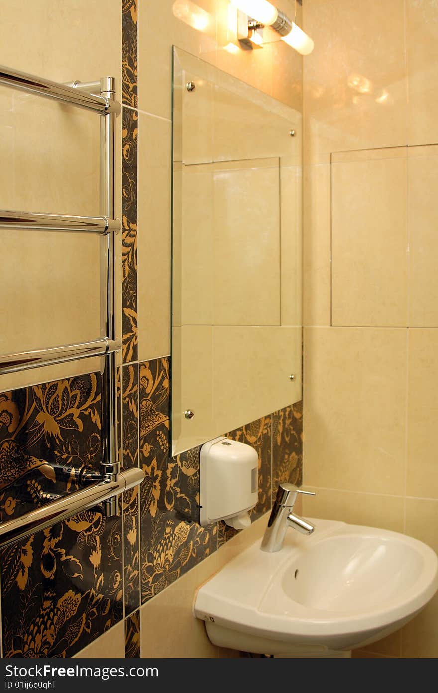 Luxury washroom in a hotel suite, with mirror. Luxury washroom in a hotel suite, with mirror