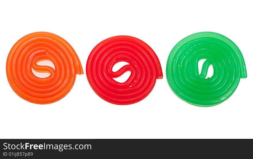 Colorful rolls of candy, isolated on a white background. Colorful rolls of candy, isolated on a white background