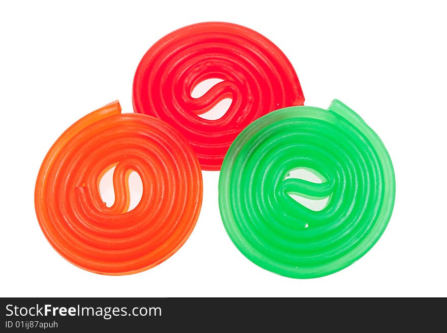 Colorful rolls of candy, isolated on a white background. Colorful rolls of candy, isolated on a white background