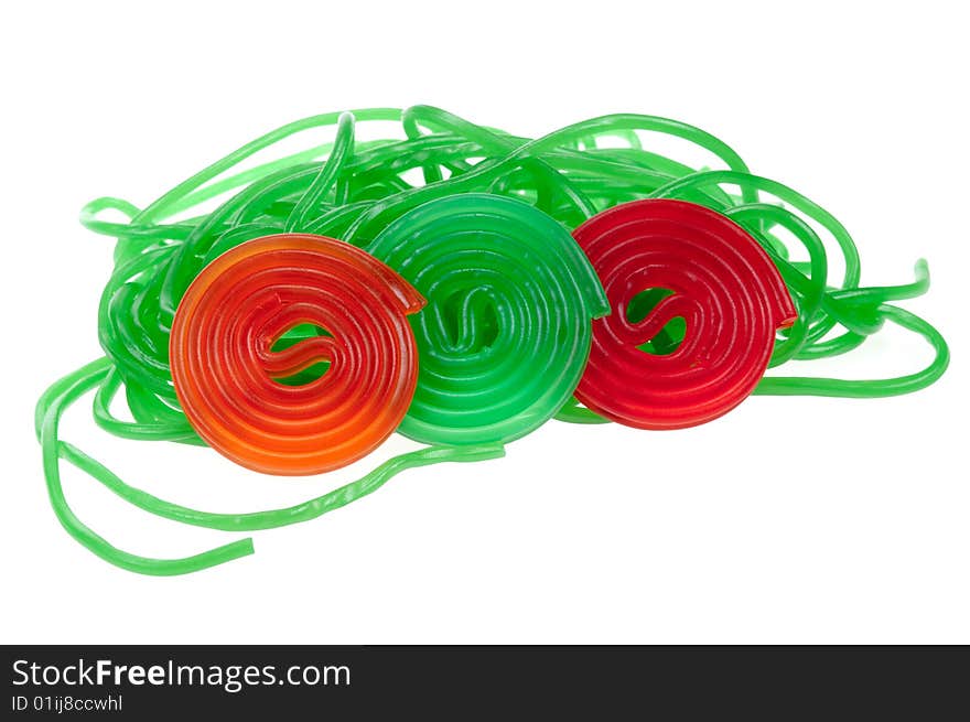 Colorful rolls of candy, isolated on a white background. Colorful rolls of candy, isolated on a white background