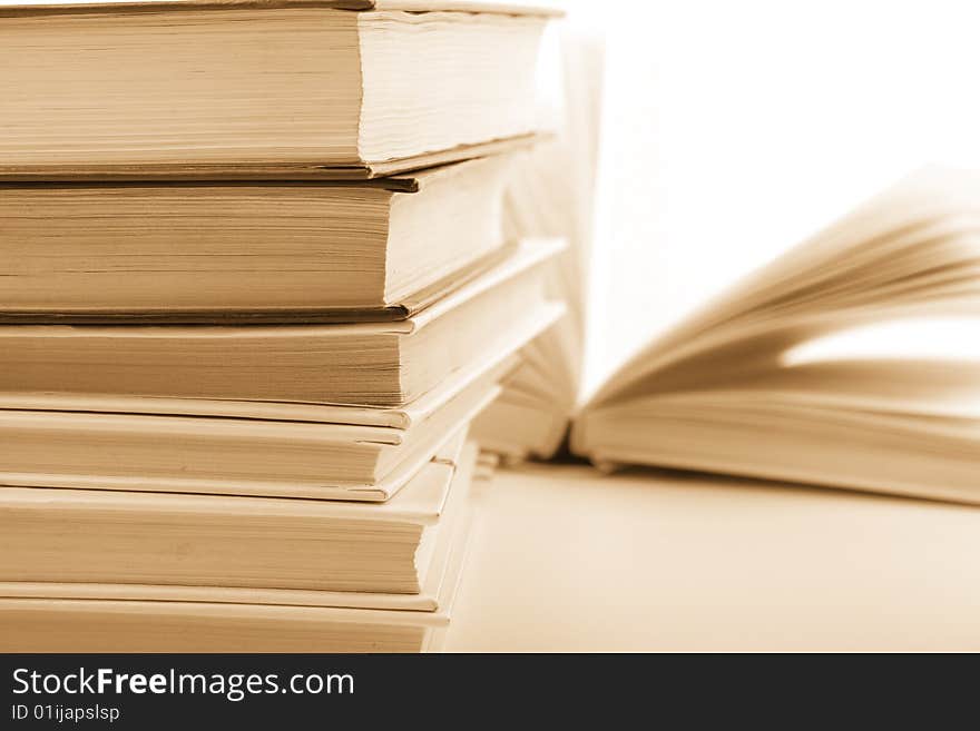 Stack of books closeup. monochrome image