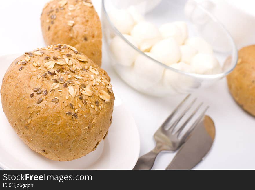 Bread and mozzarella closeup on white