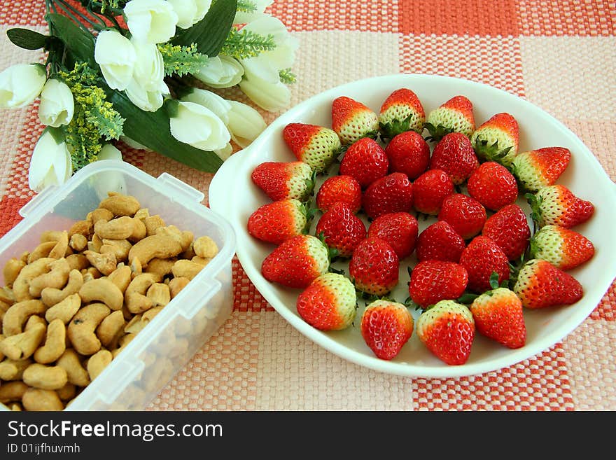 Healthy breakfast - cereal with white yogurt and with strawberries in saucer. Healthy breakfast - cereal with white yogurt and with strawberries in saucer