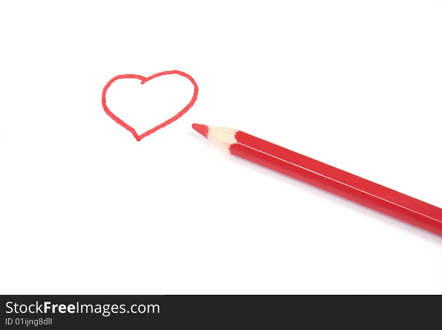 Heart symbol and red pencil