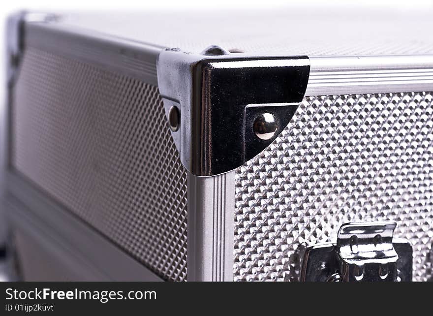 Metal suitcase on white background