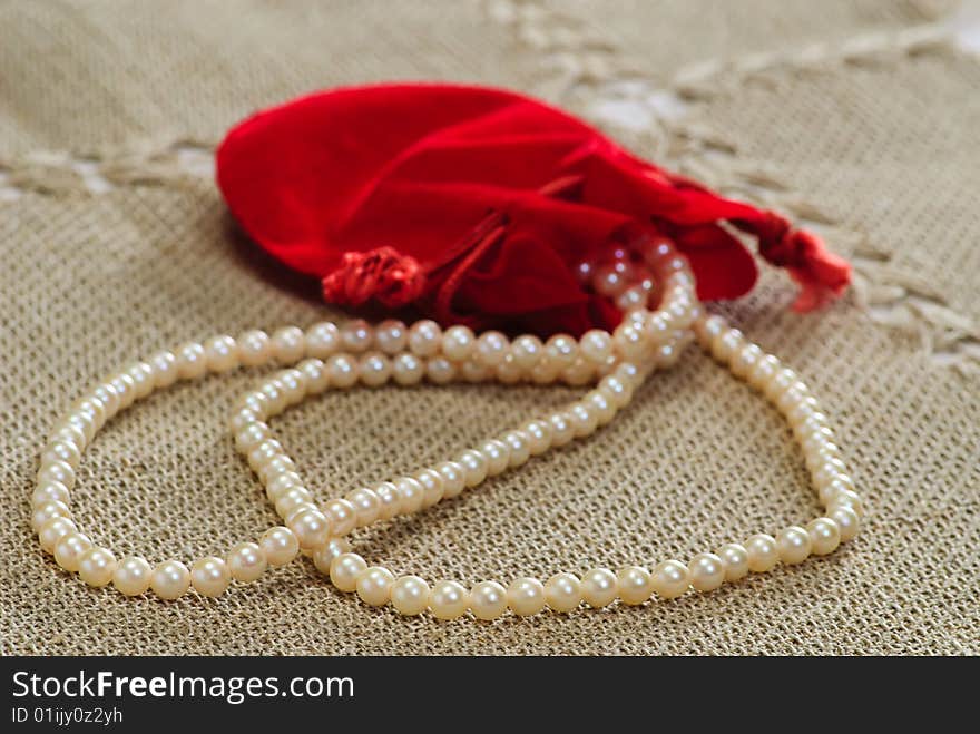 Pearls  necklace and pocket