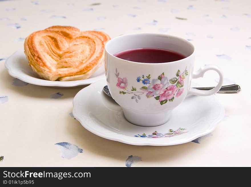 Cookies and a cup of tea on the table