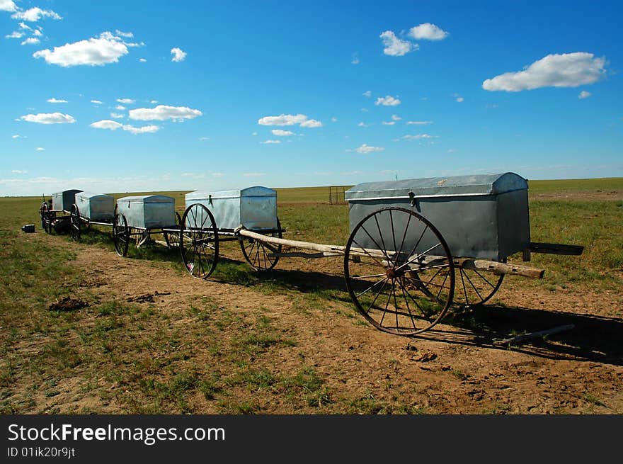 Beautiful blue sky and white clouds of cattle and sheep on the grasslands. Beautiful blue sky and white clouds of cattle and sheep on the grasslands