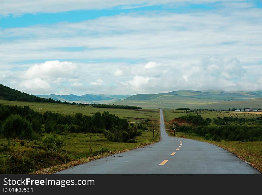 Beautiful blue sky and white clouds of cattle and sheep on the grasslands. Beautiful blue sky and white clouds of cattle and sheep on the grasslands