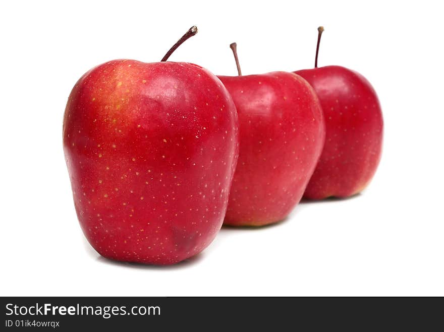 Ripe red apples isolated on white background