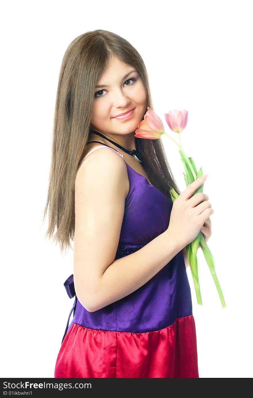 Portrait of a beautiful young woman with tulips in her hands. Portrait of a beautiful young woman with tulips in her hands