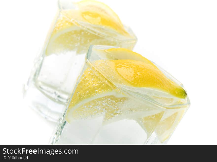 Soda water and lemon slices