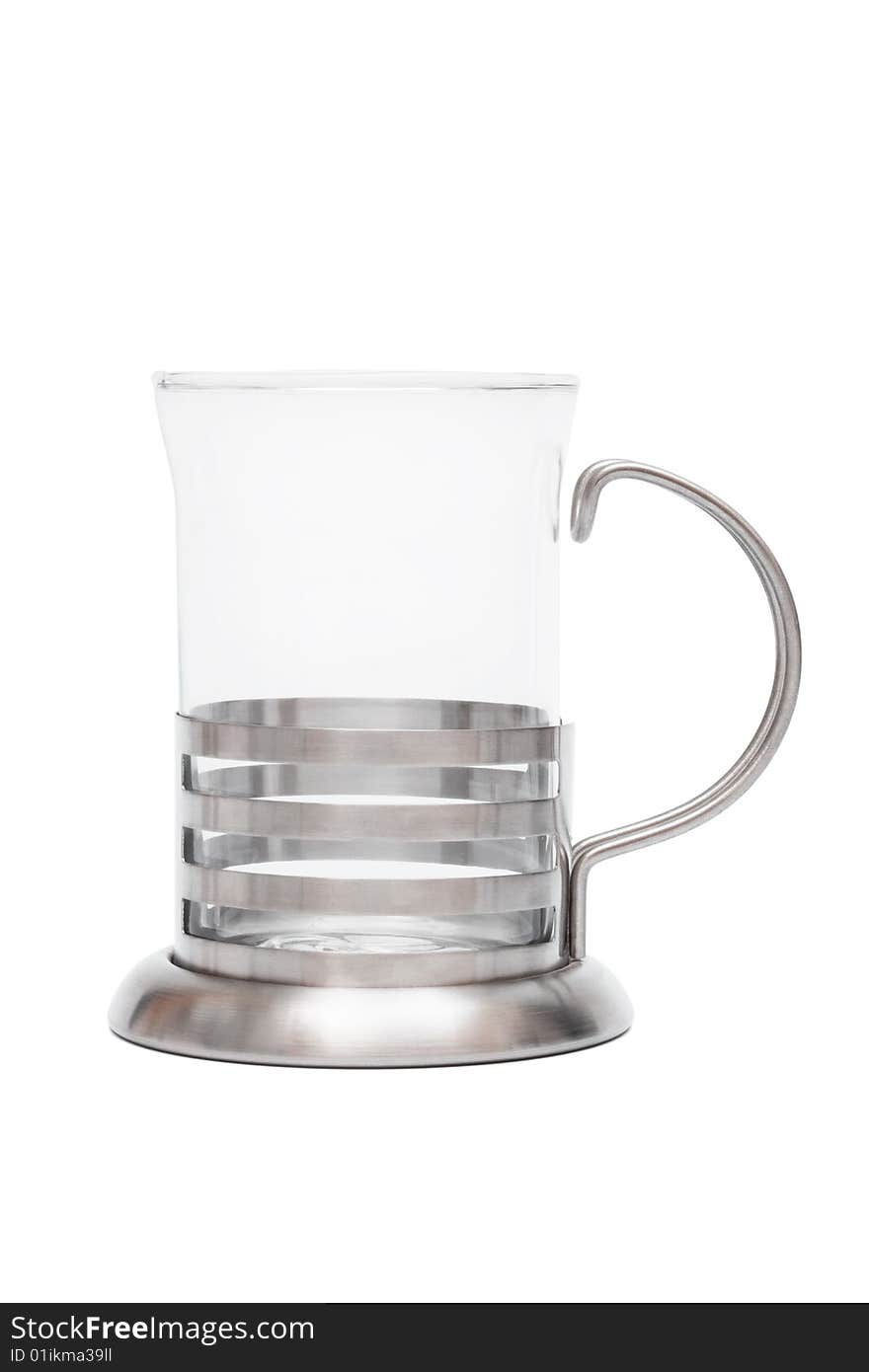 Glass mug in steel frame on a white background