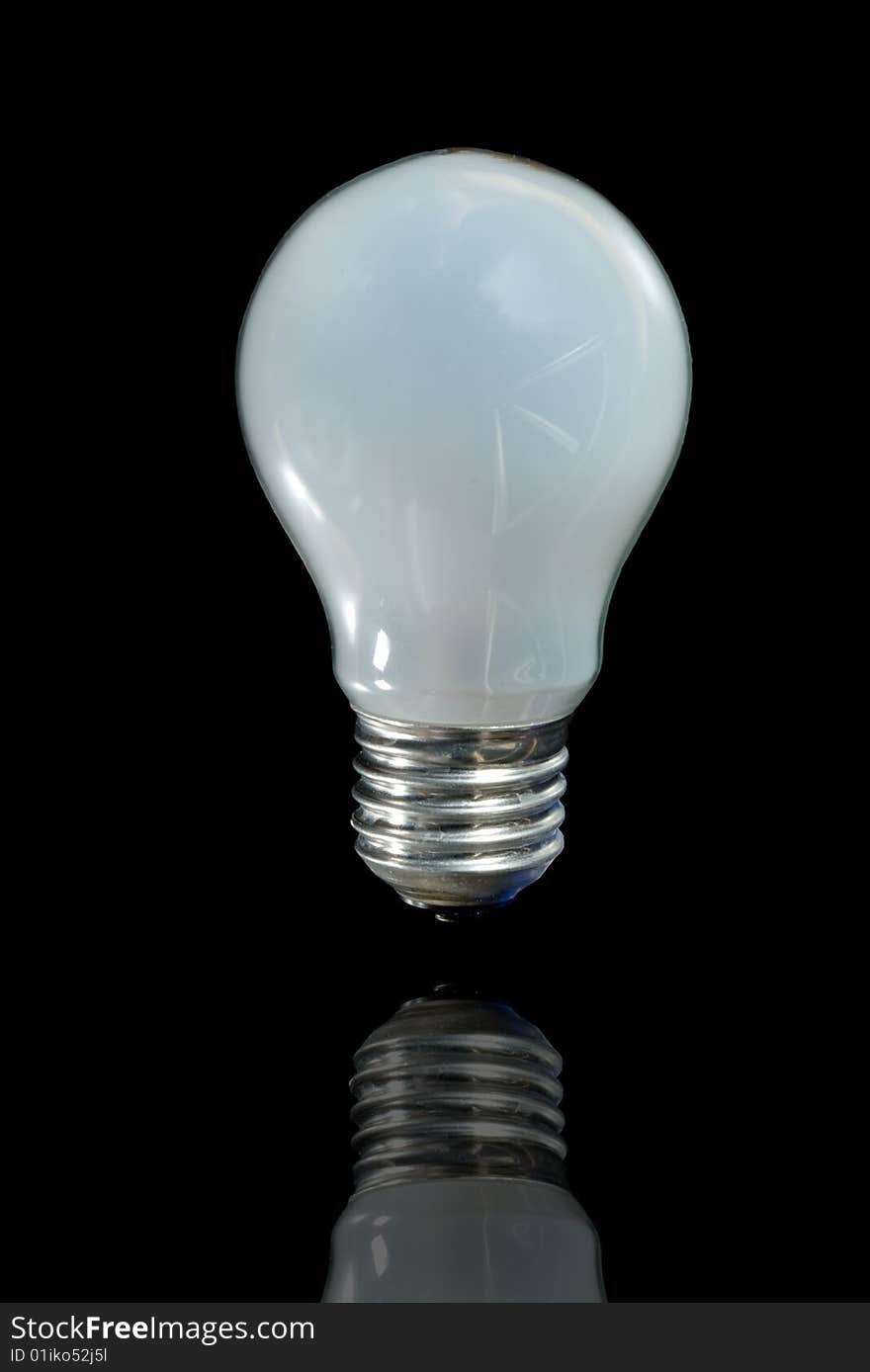 Incandescent lamp on a black background