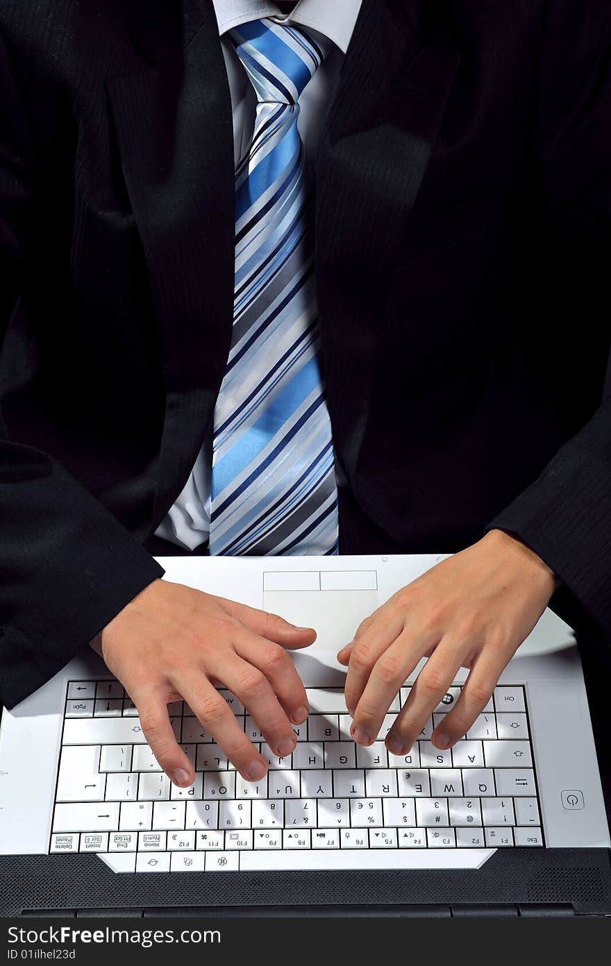 Top view of businessman typing on leptop. Top view of businessman typing on leptop