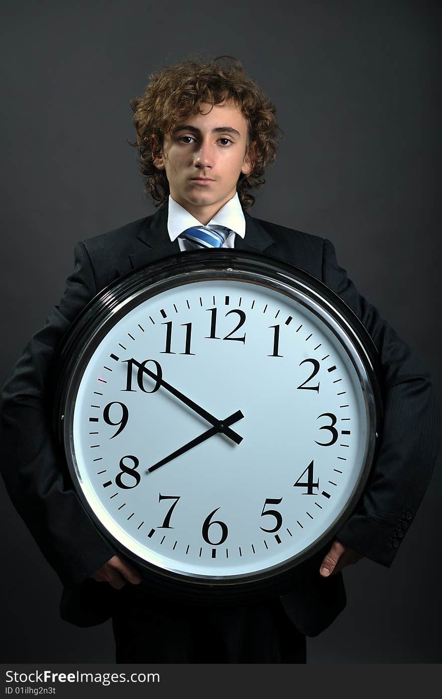 Businessman with clock