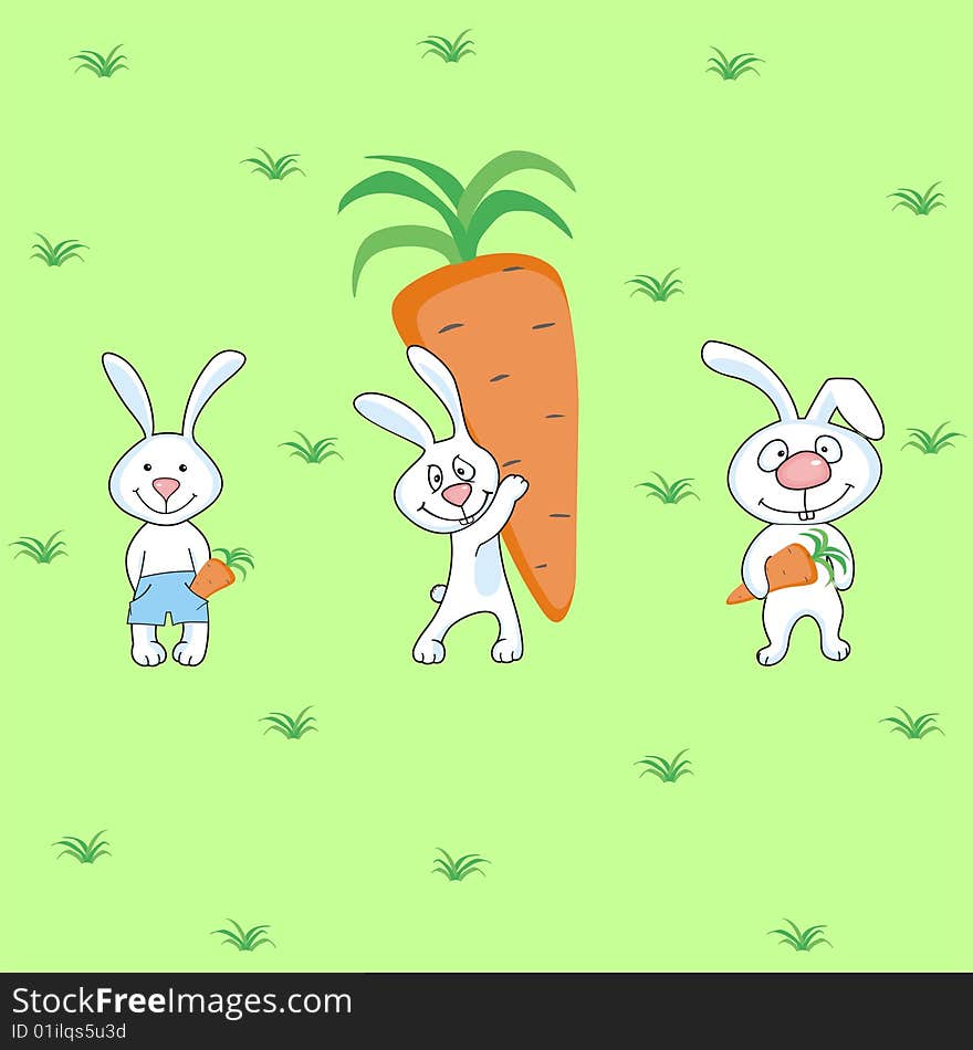 Rabbits with carrots on a green meadow