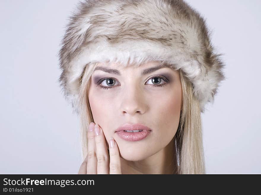 Winter girl in a warm hat