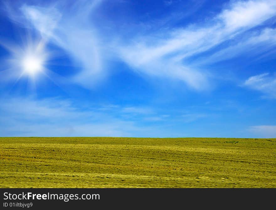 Rural landscape with sun rays