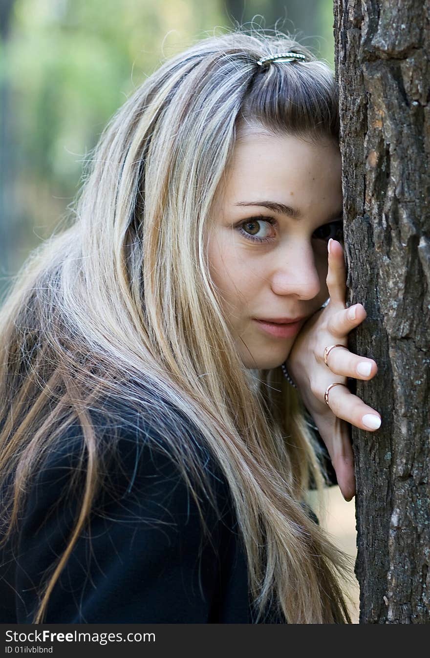 Portrait of beautiful blond girl outdoor