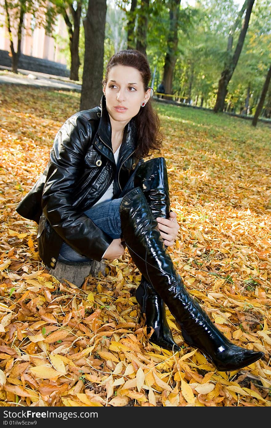 Pretty girl in autumn leafs