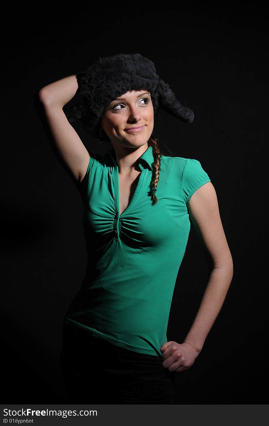 Woman in a fancy russian hat over black