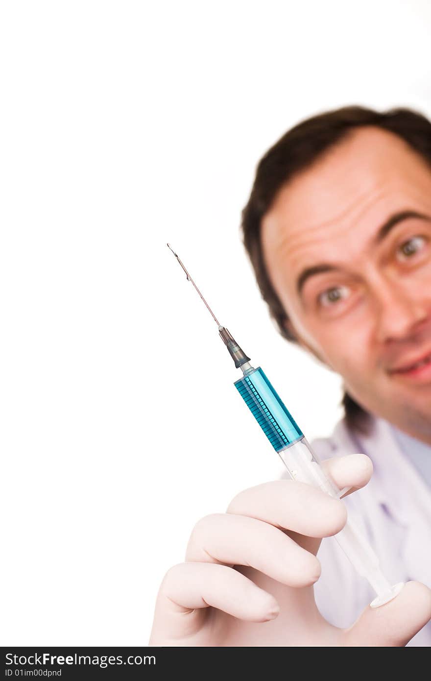 Male medic holding syringe. Isolated