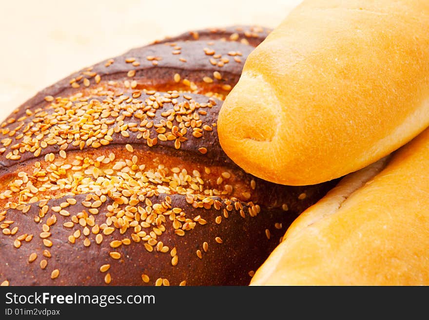 Rye bread and two baguettes, shot closeup