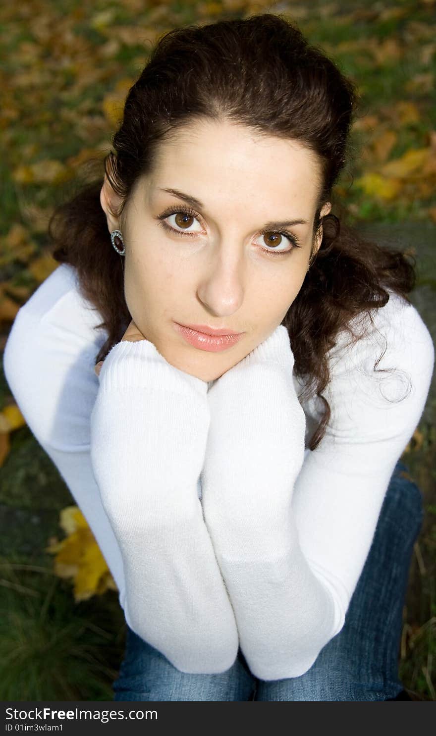 Portrait of beautiful girl in autumn