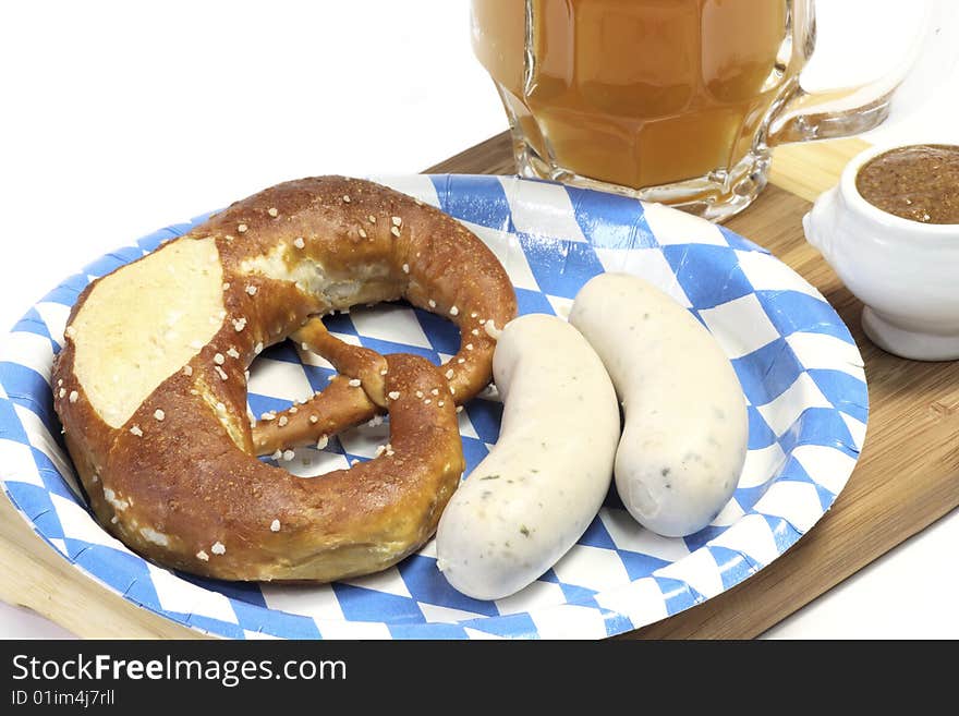 Bavarian veal sausage with mustard, pretzel and beer