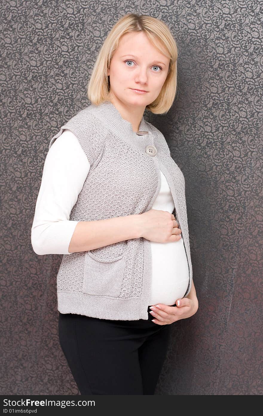 Pregnant female on a white background. Pregnant female on a white background